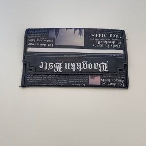 New newspaper clutch in black
